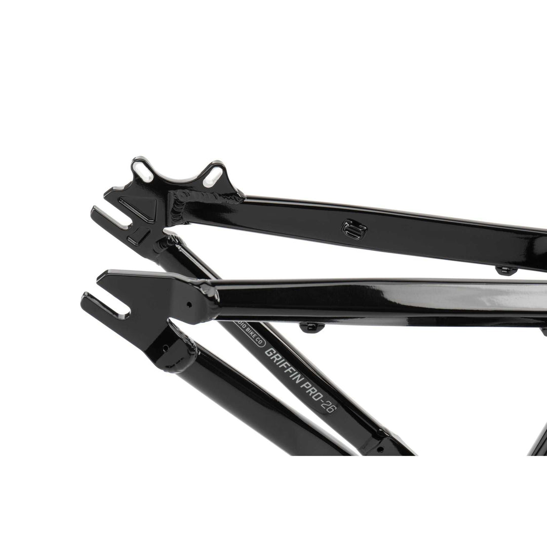 Close-up of black RADIO GRIFFIN PRO hydroformed aluminum BMX bike frame with gyro/rotor tab holes and Crankstopper bolt system.