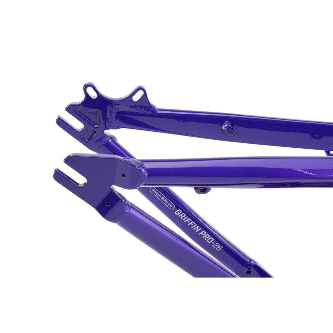 Close-up of the purple RADIO GRIFFIN PRO hydroformed BMX frame rear triangle with disc brake mount and dropout slots.