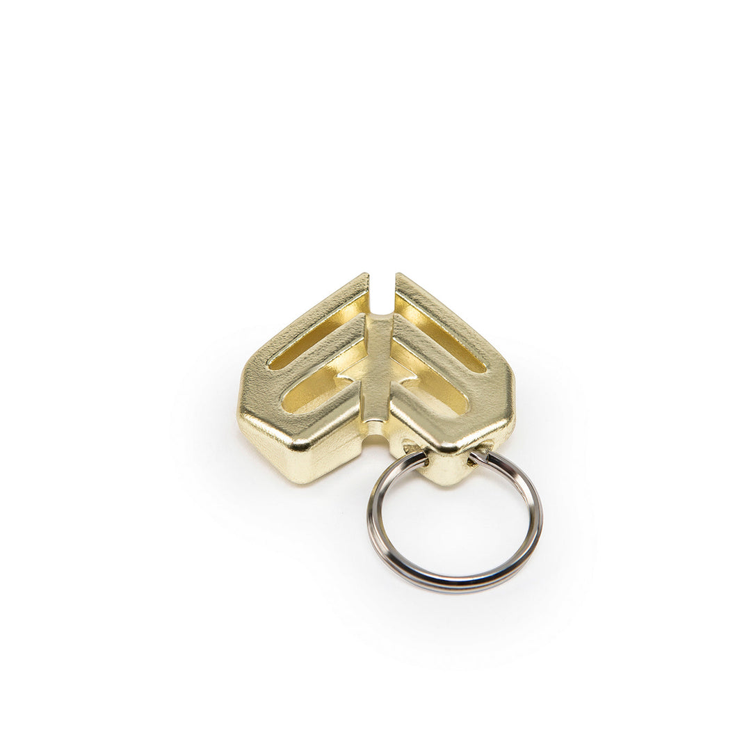 ÉCLAT SPOKE KEY CHAIN in gold, made from heat-treated chromoly, durable for 3.5mm spoke nipples.