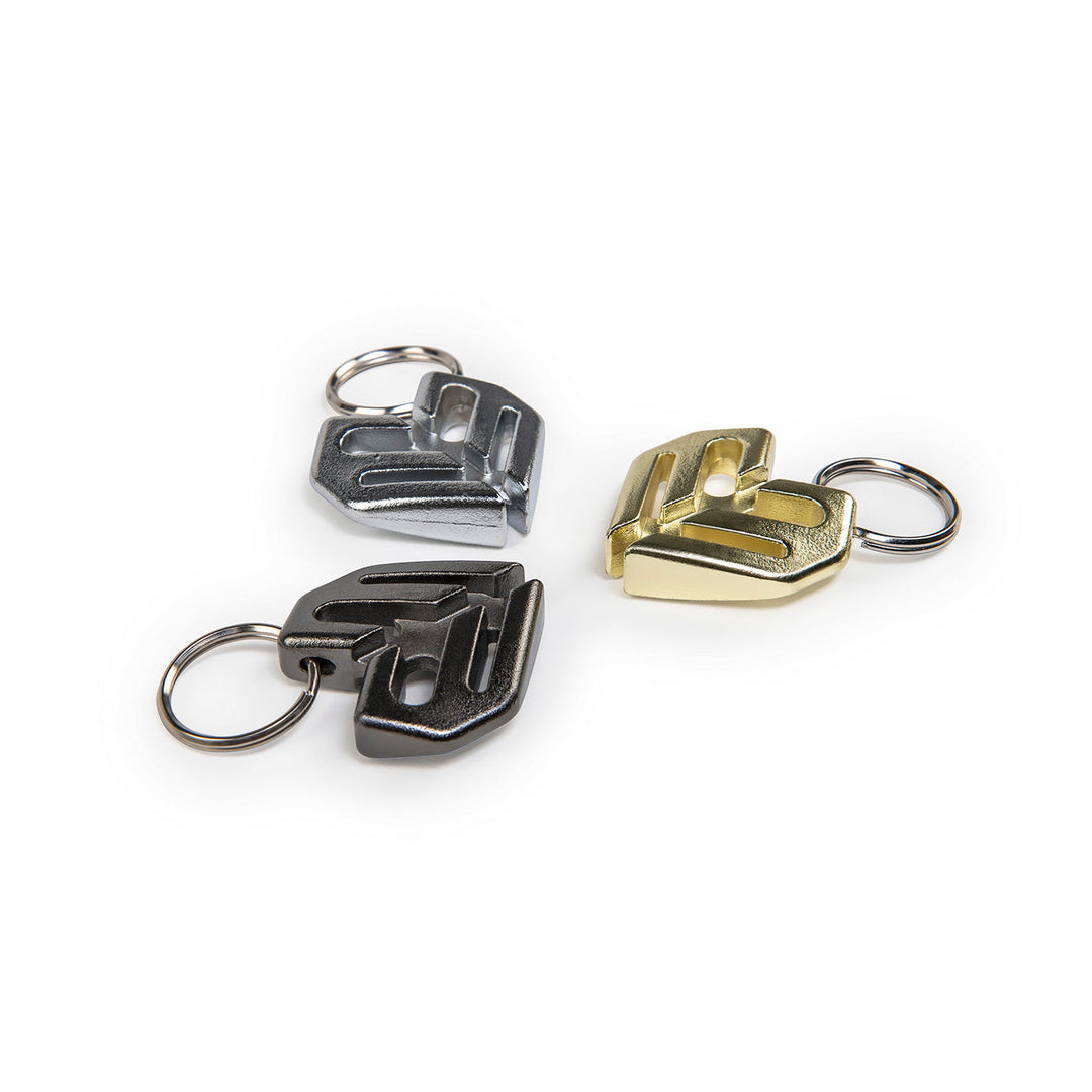 ÉCLAT SPOKE KEY CHAIN heat-treated chromoly key rings in black, silver, and gold for 3.5mm spoke nipples.